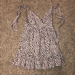 Black polka dotted dress